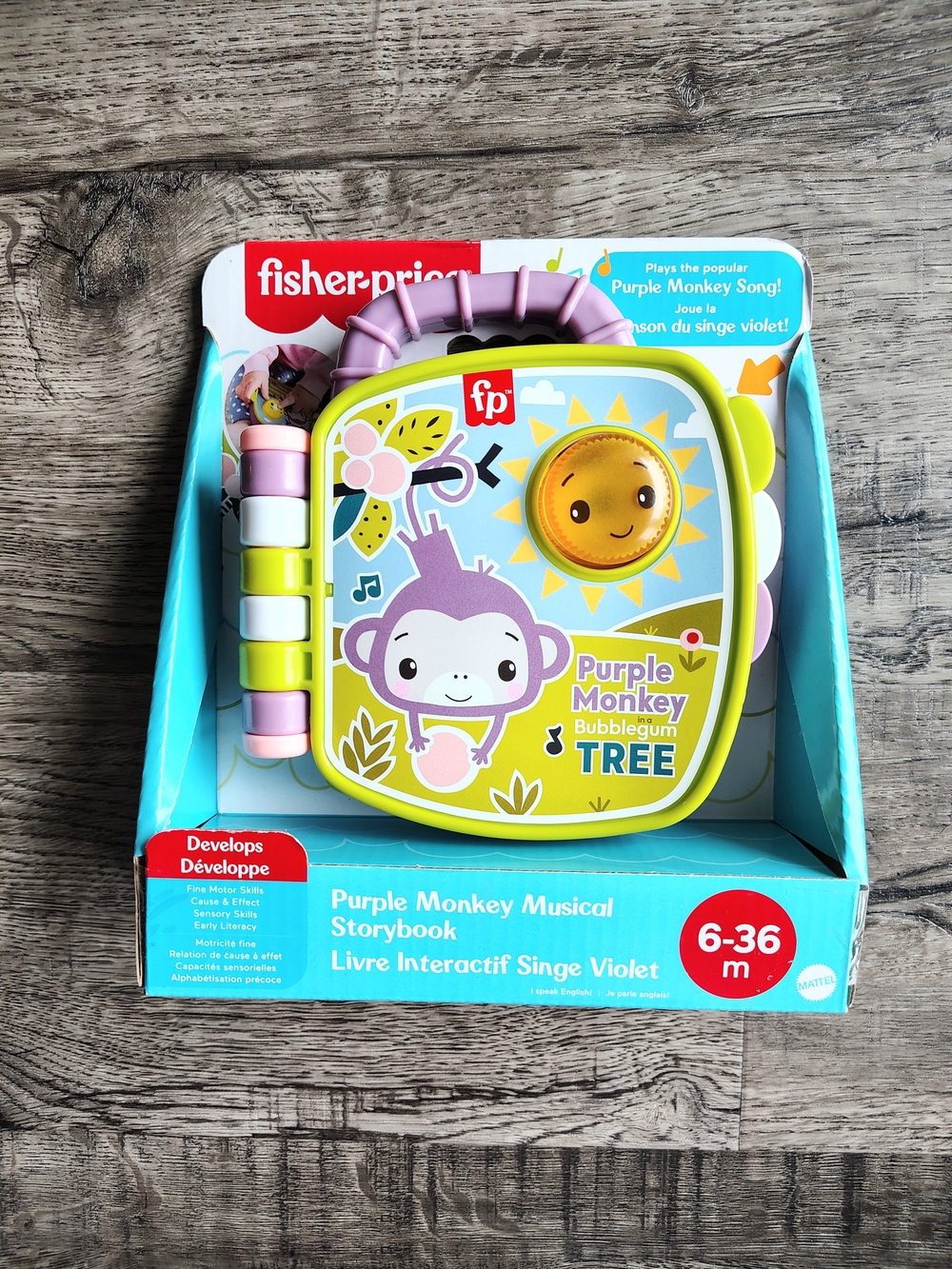 Fisher-Price Purple Monkey Musical Storybook Toy for Baby & Toddler with Lights